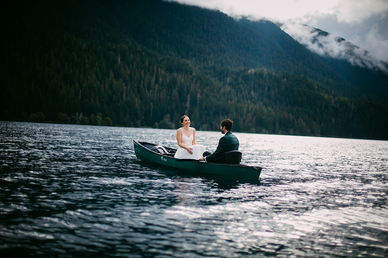 Bride and groom on a canoe