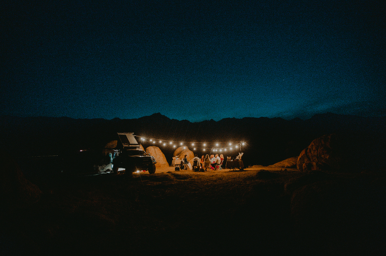 Paul and Kristi's reception is underway as the moon rises over Alabama Hills.
