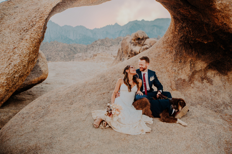 Paul, Kristi and Wiley sit under the Alabama Hills arch after sunset. 