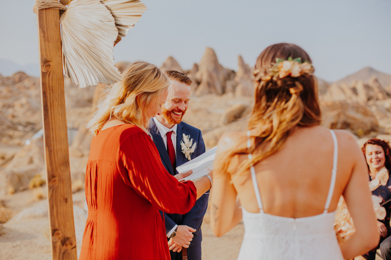 Paul laughs as his sister reads from her book during their Alabama Hills elopement.