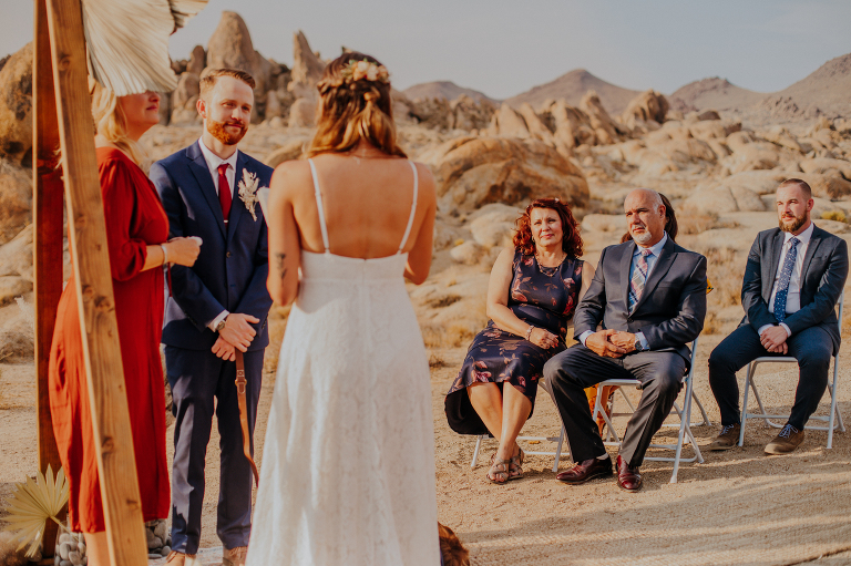 Kristi's parents watch as Paul and Kristi say their vows during their Alabama Hills elopement.