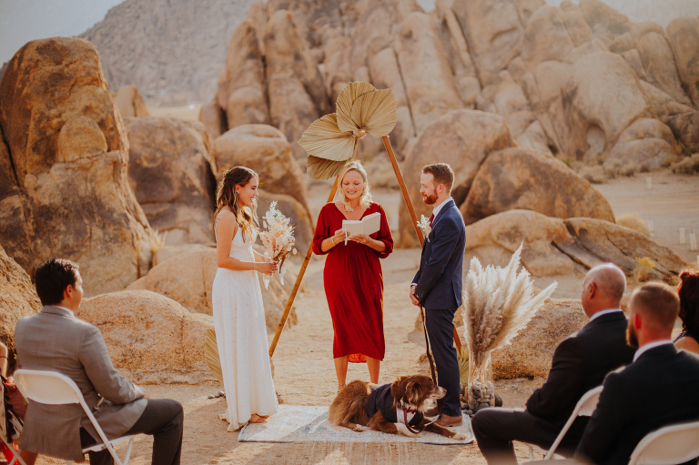 Paul and Kristi join hands at the alter during their Alabama Hills elopement.